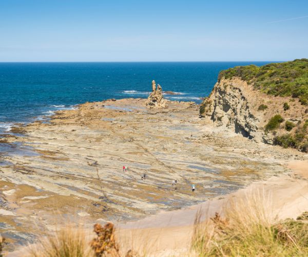 View of rocks and cliffs at Eagles Nest in low tide